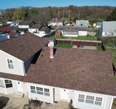 Aerial Shot Of A Brown Shingle Roof