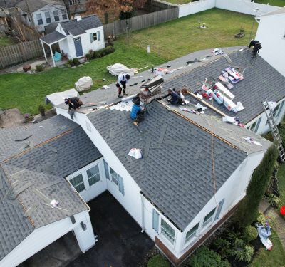 Class Roofing's Crew Working On A Residential Roof