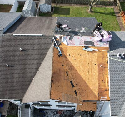 Class Roofing's Crew Replacing A Home's Roof